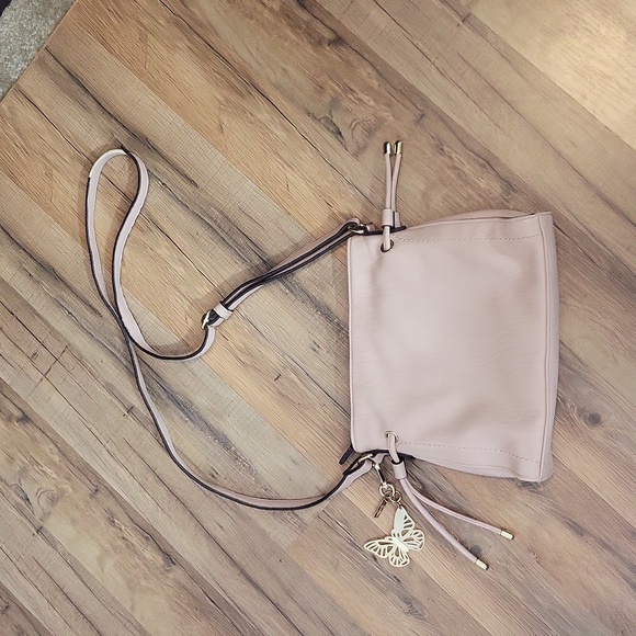 JESSICA SIMPSON Pink Faux Leather Crossbody with Removable Butterfly Key Charm - Picture 7 of 16